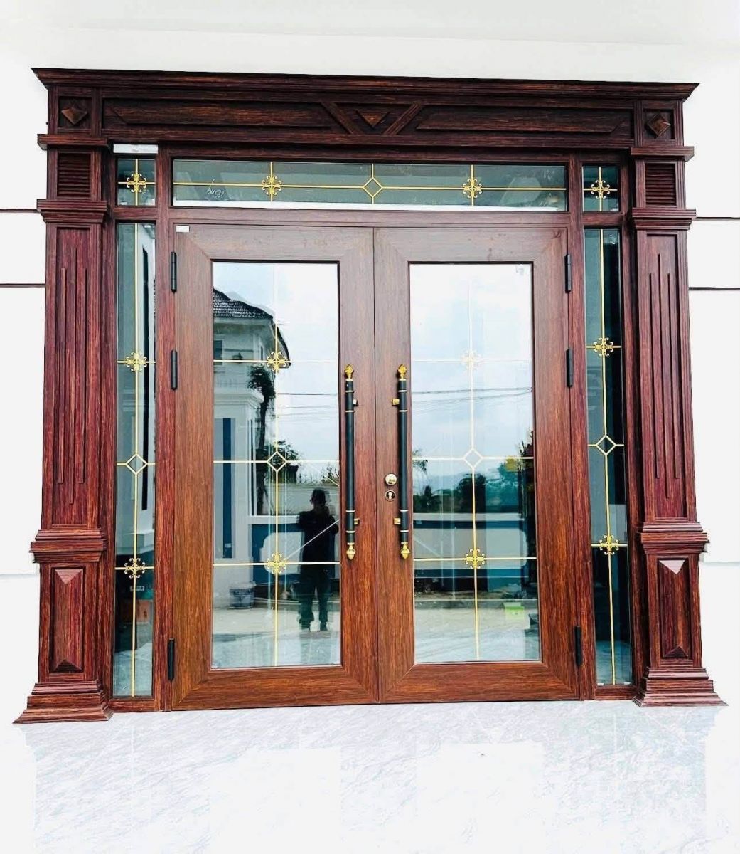 cửa nhôm thủy lực màu vân gỗ