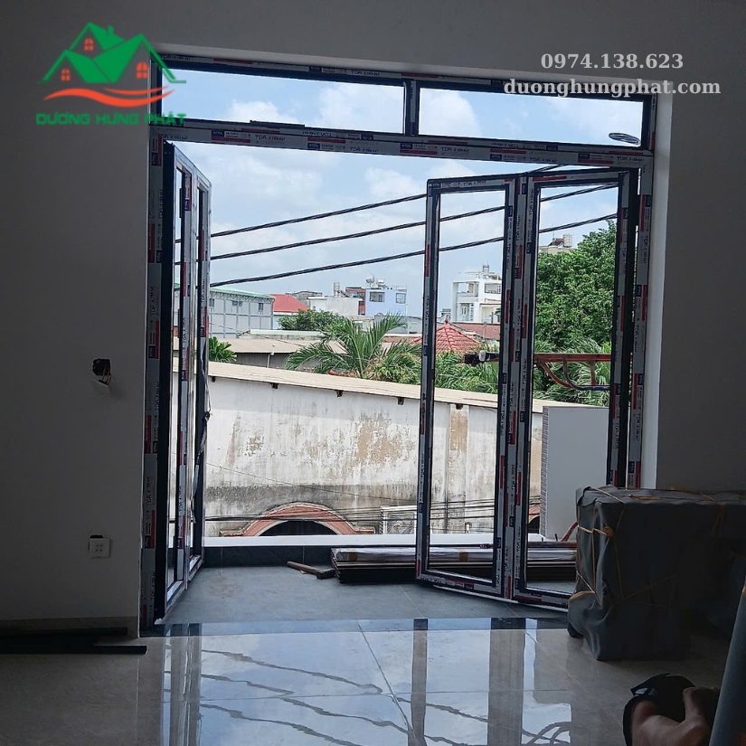 cửa đi mở quay 4 cánh nhôm Xingfa tại Tăng Nhơn Phú TP.HCM