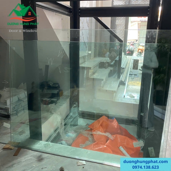 thi công vách kính cường lực thang máy tại Bình tân TP.HCM