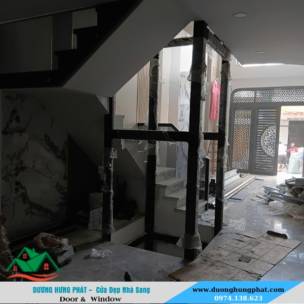 thi công vách kính thang máy giá rẻ