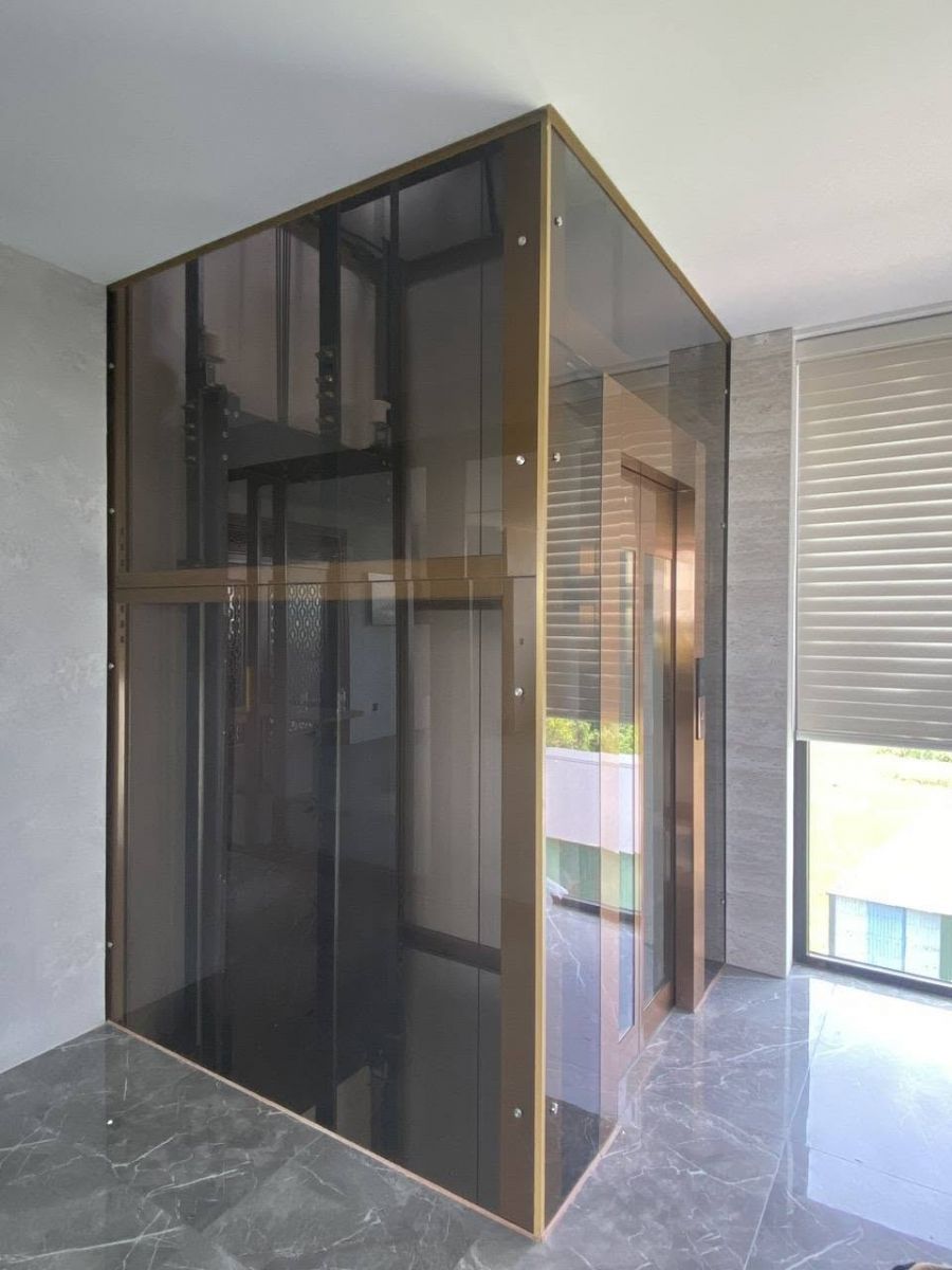 thi công lồng kính thang máy tại quận 9 TP.HCM